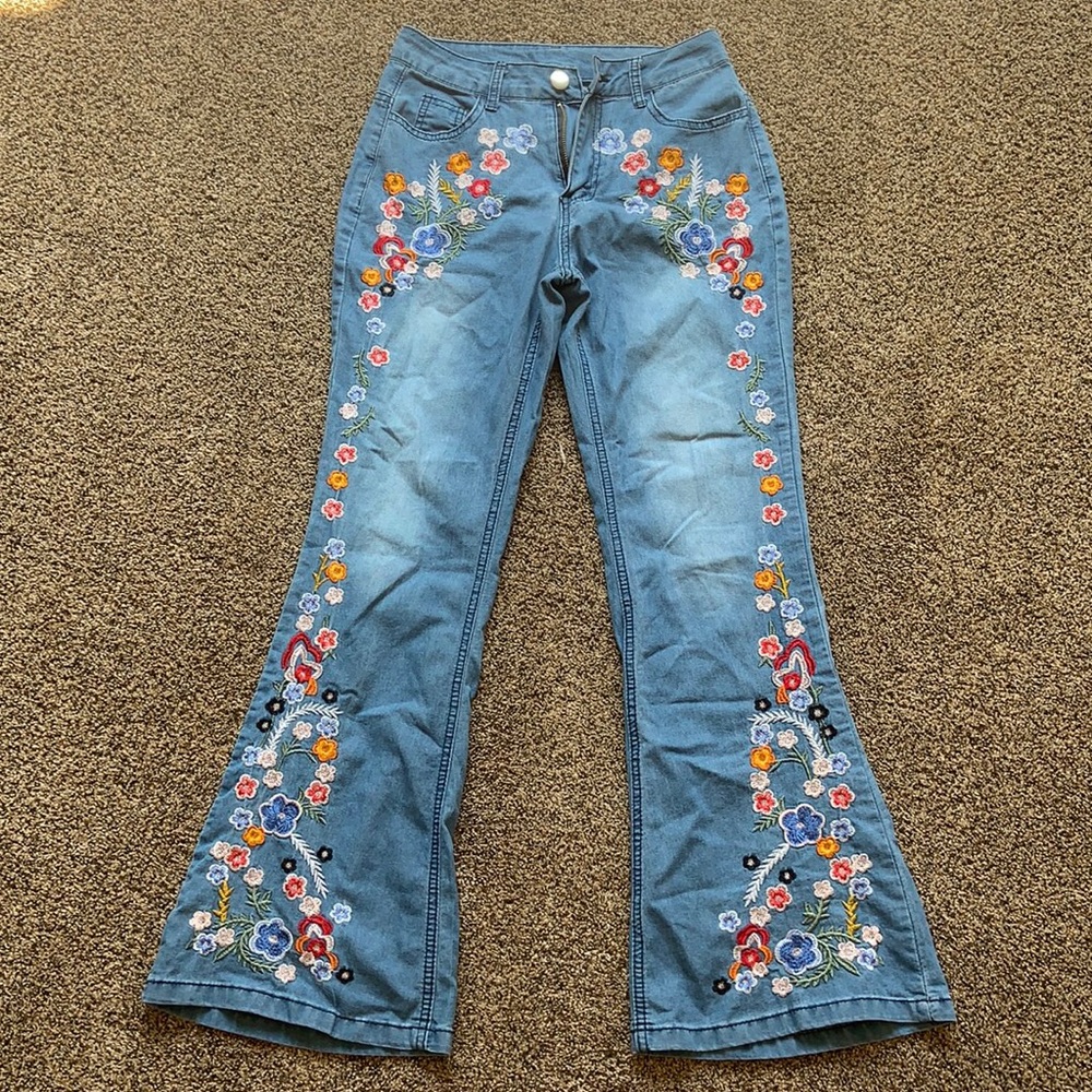 Flower embroidered high rise flare jeans
